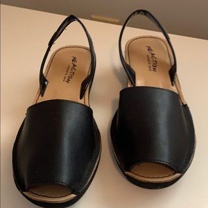 Reaction Kenneth Cole Black peep toes/back strap.